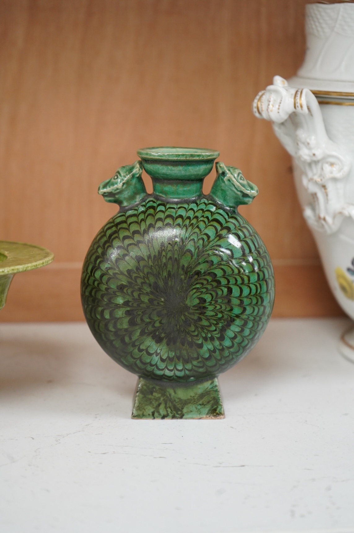 A Chinese agate ware flask, a sancai ewer and a stem dish, largest 26cm high
